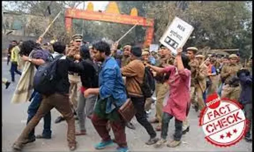 Viral Photo Of JNU Student Holding An Anti-RSS Sign Is From 2016
