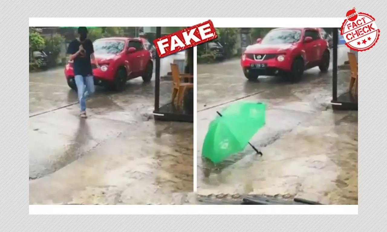No, This Video Of A Man Disappearing Into A Puddle Is Not Real
