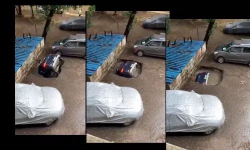 Video: Car Sinks As Parking Lot In Mumbais Residential Area Caves In