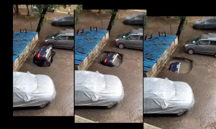 Video: Car Sinks As Parking Lot In Mumbais Residential Area Caves In