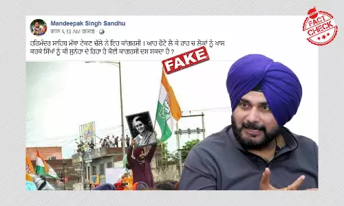 Image Of Navjot Singh Sidhu Holding A Photo Of Indira Gandhi Is Fake