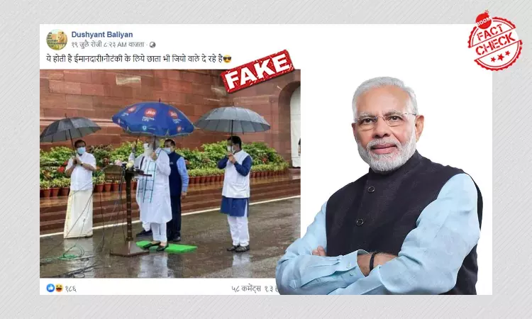 Photo Of PM Modi Holding A Jio Umbrella Is Satire