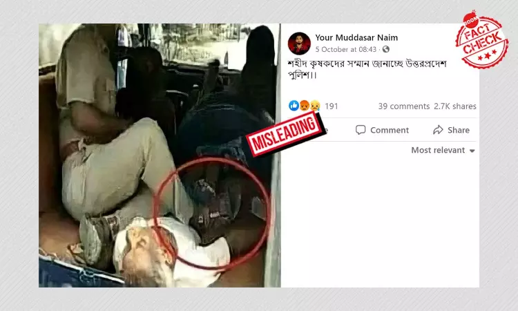 Old Photo Of Cop Placing Foot On A Body Falsely Linked To Lakhimpur Incident