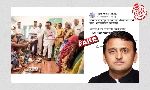 Old Image Of Akhilesh Yadav Distributing Food Falsely Linked To Navratri