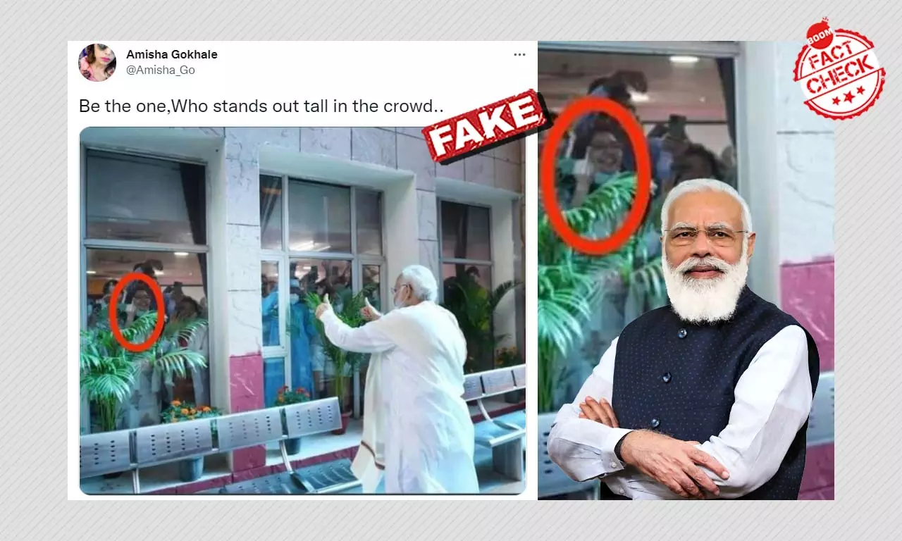 Viral Photo Of A Healthcare Worker Gesturing At PM Modi Is Morphed