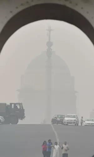Delhis Diwali Dilemma: Thick Smog Engulfs City As AQI Dips to Severe Category