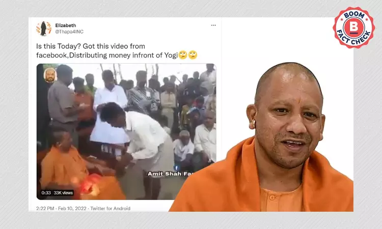 No, This Video Does Not Show Yogi Adityanath Bribing Voters With Cash