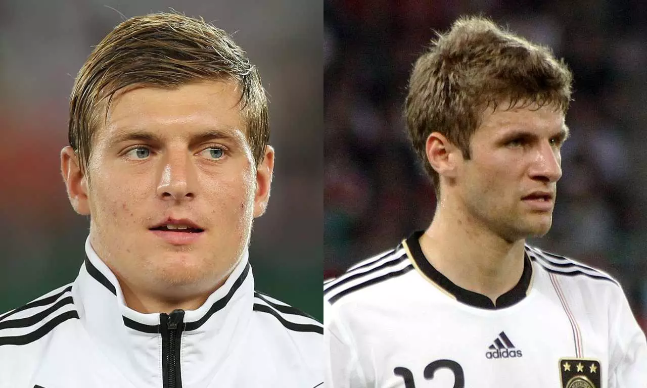 2014 World Cup champions with Germany - Toni Kross (left) and Thomas Müller (right)