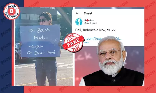 Viral Photo of Woman Holding Go Back Modi Placard Is Morphed