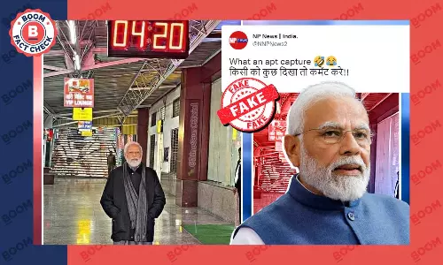 Photo Of Narendra Modi Standing Below Clock With Time As 4:20 Is Morphed
