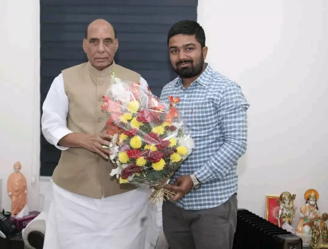 YouTuber Manish Kashyap with Union Minister Rajnath Singh. Photo: Manish Kashyap/Facebook