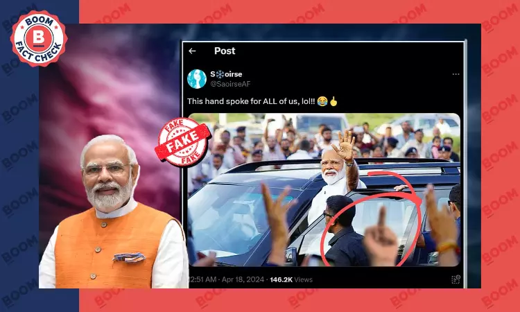 Photo Showing Obscene Gesture Aimed At PM Modi Is Digitally Altered