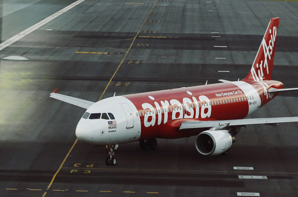 ​AirAsia aircraft model seen on track at Sepang Airport (Credit: Reuters)