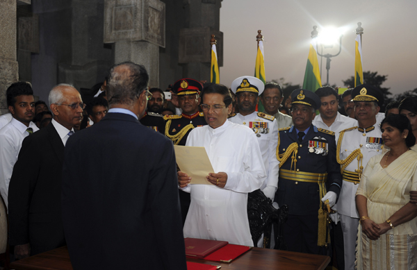 Sri Lanka's newly elected President Sirisena is sworn in during the country's sixth executive presidential swearing-in ceremony in Colombo