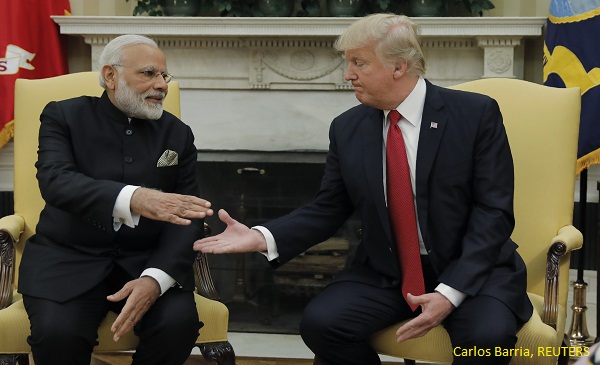 Mod and Trump handshake