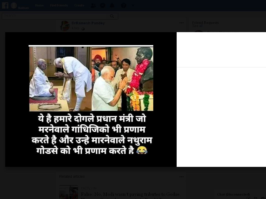 viral image of modi bowing to godse bust